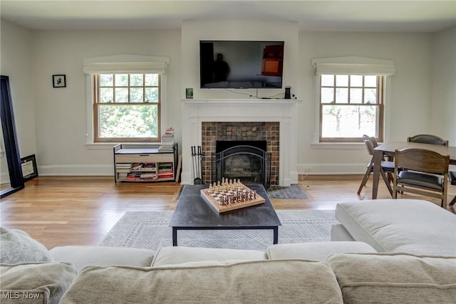 2472 Overlook Rd Unit 5, Cleveland Heights, OH 44106 - living room with healthy amount of natural light, wood finished floors, and a tile fireplace