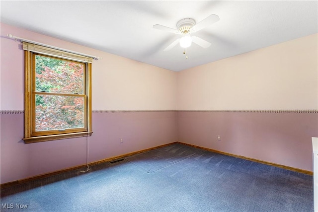 9852 Hocking St NW, Massillon, OH 44646 - empty room featuring carpet floors and ceiling fan