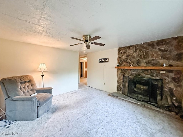 8756 Cook Rd, Salem, OH 44460 - unfurnished living room with a ceiling fan, a fireplace, and carpet