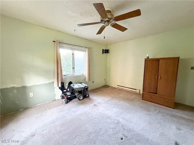 8756 Cook Rd, Salem, OH 44460 - empty room featuring a baseboard heating unit, light colored carpet, a ceiling fan, and a textured ceiling