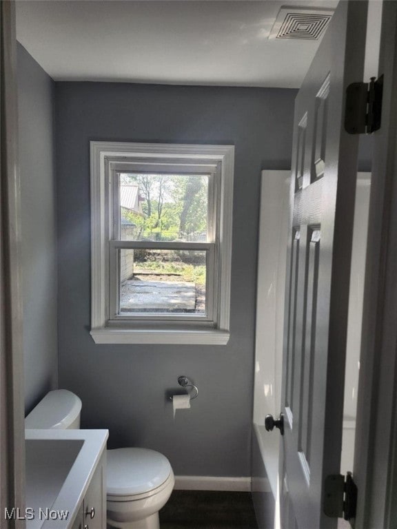 1146 Easton Dr, Akron, OH 44310 - bathroom with vanity and wood finished floors