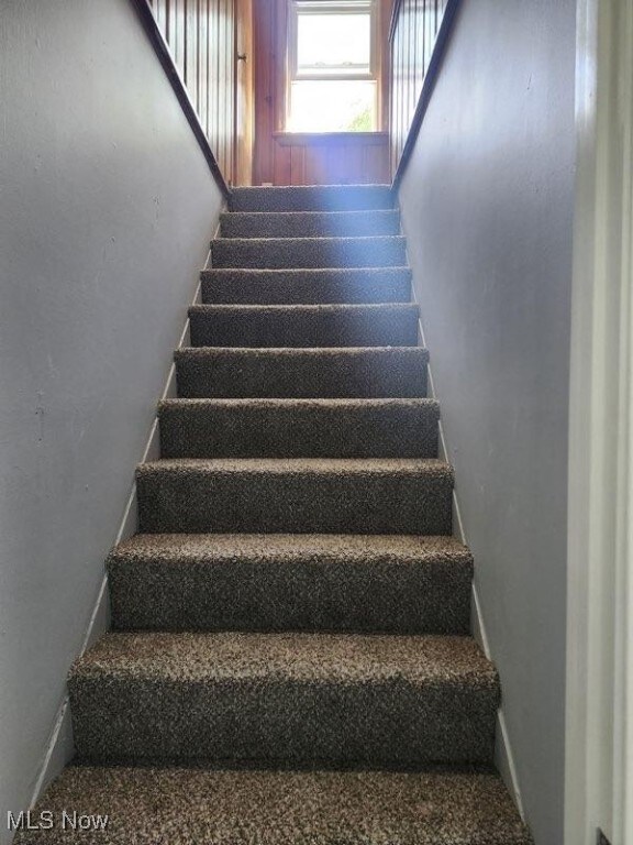 1146 Easton Dr, Akron, OH 44310 - stairs featuring baseboards
