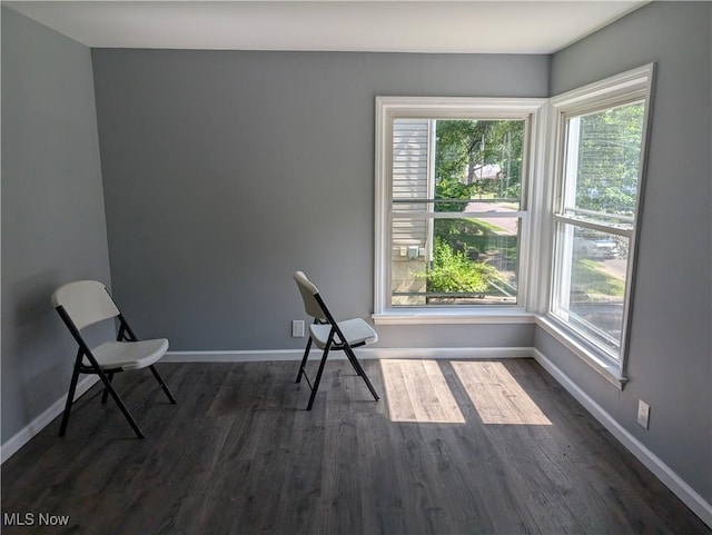 1146 Easton Dr, Akron, OH 44310 - unfurnished room featuring plenty of natural light and dark wood-style flooring