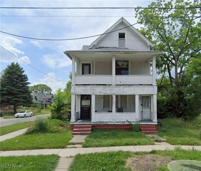 1201 Ewing St, Toledo, OH 43607 - american foursquare style home with a porch