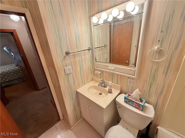 bathroom with vanity and tile patterned flooring
