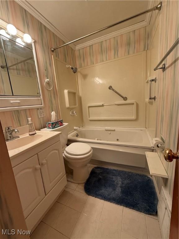 bathroom with tile patterned flooring, washtub / shower combination, vanity, and ornamental molding