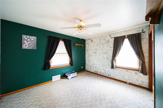 5132 Chestnut Hill Dr, Willoughby, OH 44094 - carpeted spare room featuring wallpapered walls and a ceiling fan