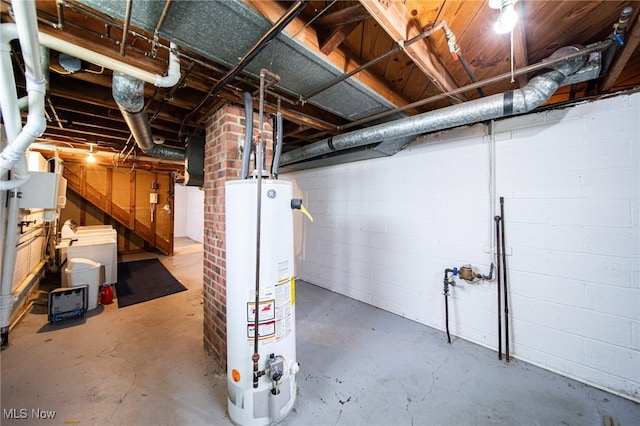 5132 Chestnut Hill Dr, Willoughby, OH 44094 - unfinished basement featuring water heater and concrete block wall