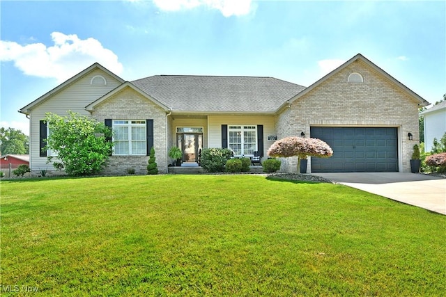 257 Country Club Dr SE, Warren, OH 44484 - view of front of house featuring a garage, brick siding, a front lawn, and driveway