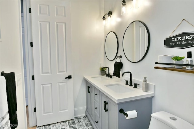 257 Country Club Dr SE, Warren, OH 44484 - bathroom with double vanity and toilet