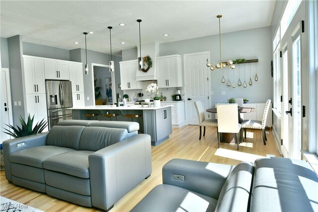257 Country Club Dr SE, Warren, OH 44484 - living room featuring light wood-style floors and recessed lighting