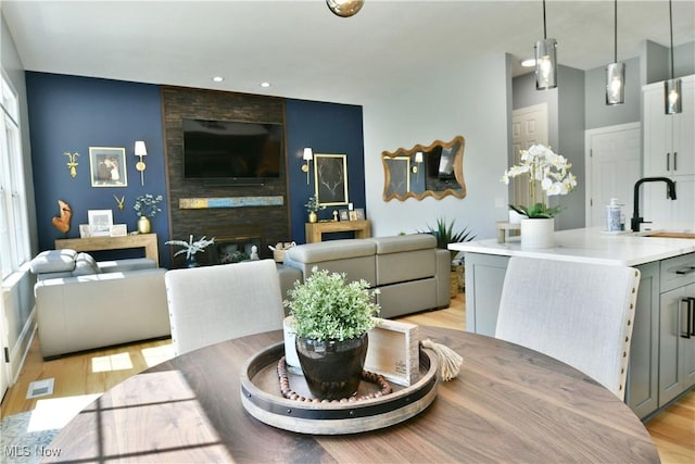 257 Country Club Dr SE, Warren, OH 44484 - dining room featuring light wood-type flooring and recessed lighting
