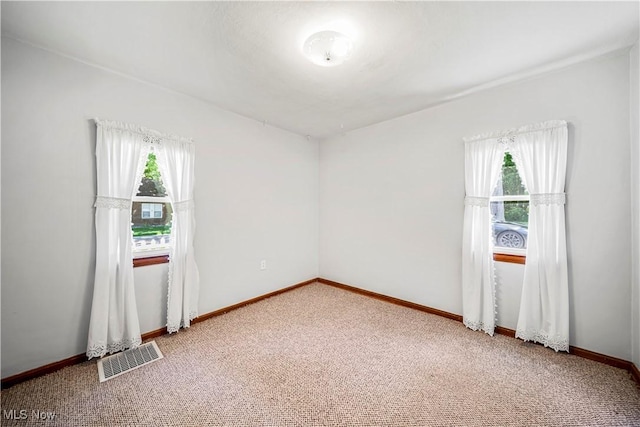 3988 Lake Rd, Conneaut, OH 44030 - carpeted empty room featuring healthy amount of natural light
