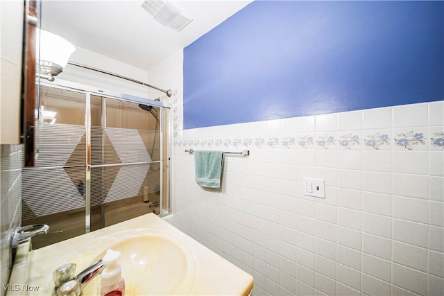 3988 Lake Rd, Conneaut, OH 44030 - bathroom with tile walls and vanity