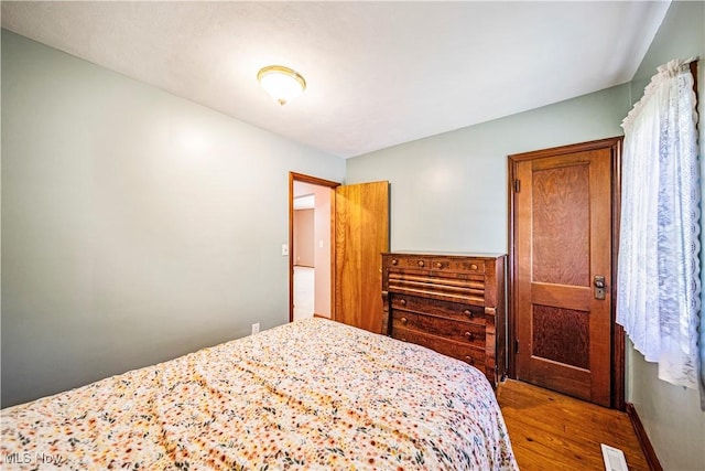 3988 Lake Rd, Conneaut, OH 44030 - bedroom featuring wood finished floors