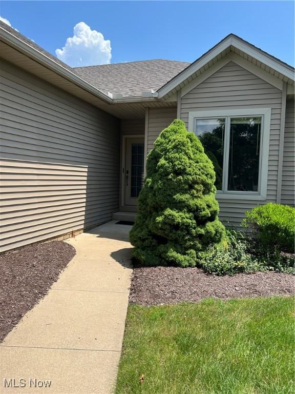 1321 Meadowbrook Dr, Dover, OH 44622 - doorway to property with roof with shingles