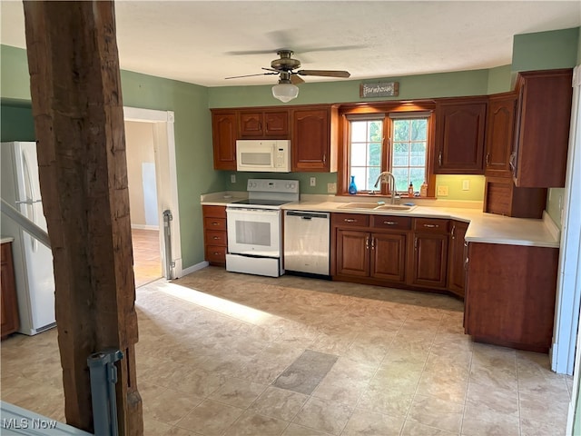 9513 Edison St NE, Alliance, OH 44601 - kitchen with white appliances, light countertops, and a ceiling fan