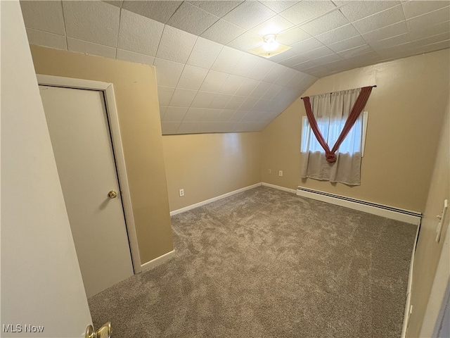 9513 Edison St NE, Alliance, OH 44601 - bonus room with baseboard heating, carpet, and lofted ceiling