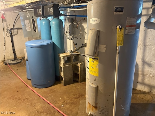 9513 Edison St NE, Alliance, OH 44601 - utility room featuring electric water heater and drainage system