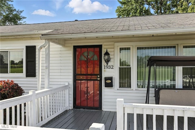1932 Meister Rd, Lorain, OH 44053 - doorway to property featuring a shingled roof