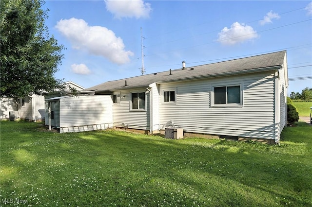 1932 Meister Rd, Lorain, OH 44053 - back of property with a yard and an outbuilding