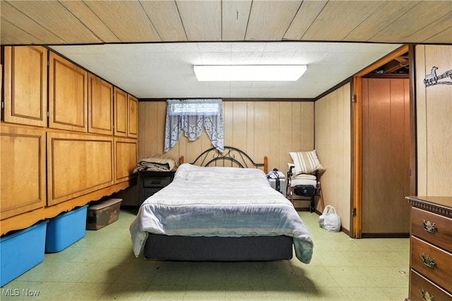 1932 Meister Rd, Lorain, OH 44053 - bedroom featuring light floors and wooden walls