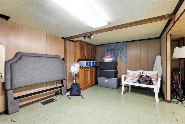 1932 Meister Rd, Lorain, OH 44053 - misc room with light flooring, wooden walls, and beam ceiling