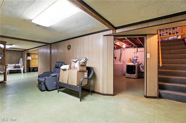 1932 Meister Rd, Lorain, OH 44053 - finished basement with stairs, washing machine and clothes dryer, wooden walls, and tile patterned floors