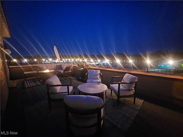 7482 Center St Unit 5, Mentor, OH 44060 - patio at twilight featuring a fire pit