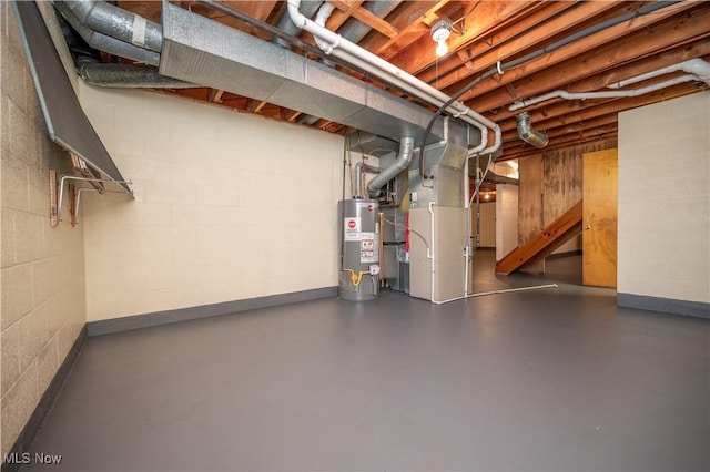 573 Grandview Ave, East Palestine, OH 44413 - unfinished basement featuring water heater, concrete block wall, and heating unit