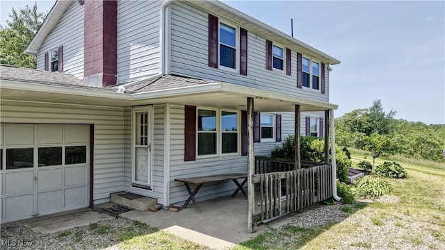 48846 Cain Ridge Rd, Clarington, OH 43915 - view of front of property with roof with shingles and a porch