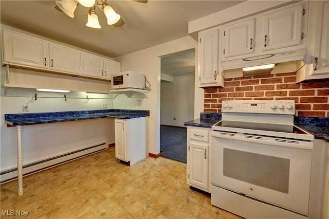 48846 Cain Ridge Rd, Clarington, OH 43915 - kitchen featuring white appliances, under cabinet range hood, ceiling fan, a baseboard radiator, and dark countertops