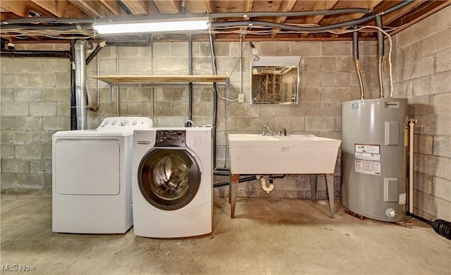 48846 Cain Ridge Rd, Clarington, OH 43915 - laundry room with electric water heater and washer and clothes dryer