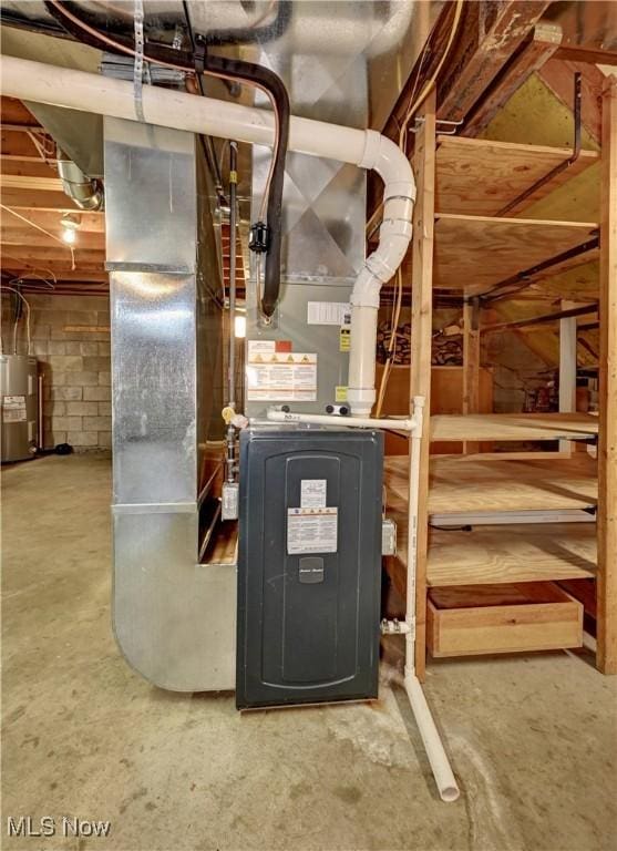 48846 Cain Ridge Rd, Clarington, OH 43915 - utility room with water heater