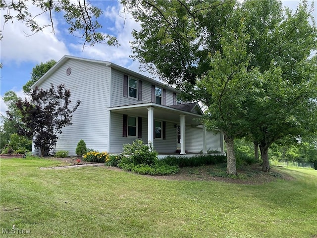 48846 Cain Ridge Rd, Clarington, OH 43915 - view of front of home with a porch and a front yard