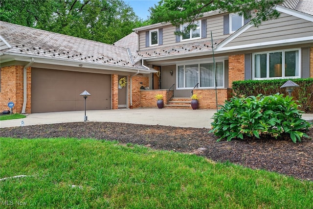 21349 Shelburne, Shaker Heights, OH 44122 - traditional home featuring driveway, brick siding, and an attached garage