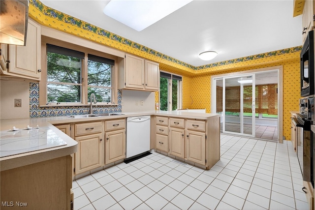 21349 Shelburne, Shaker Heights, OH 44122 - kitchen with dishwasher, wallpapered walls, a peninsula, light brown cabinetry, and light countertops