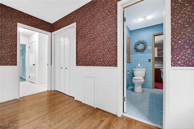 21349 Shelburne, Shaker Heights, OH 44122 - hall featuring wallpapered walls, a wainscoted wall, and wood finished floors