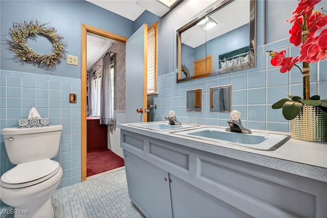 21349 Shelburne, Shaker Heights, OH 44122 - full bathroom with tile walls, double vanity, and tile patterned flooring