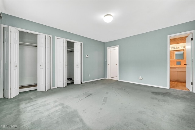 21349 Shelburne, Shaker Heights, OH 44122 - unfurnished bedroom featuring multiple closets, carpet flooring, and ensuite bathroom