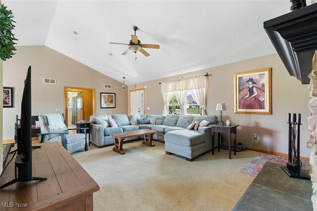 4568 Woodstone Ave NW, Massillon, OH 44647 - carpeted living room featuring ceiling fan and high vaulted ceiling