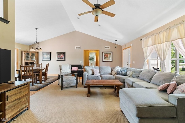 4568 Woodstone Ave NW, Massillon, OH 44647 - living area with ceiling fan, light colored carpet, and vaulted ceiling