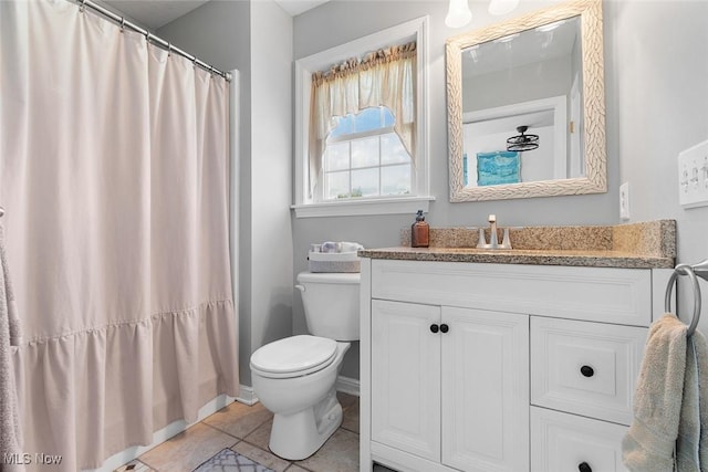 4568 Woodstone Ave NW, Massillon, OH 44647 - bathroom featuring vanity, tile patterned floors, and a shower with curtain