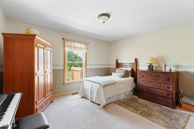 4568 Woodstone Ave NW, Massillon, OH 44647 - bedroom with light carpet and baseboards