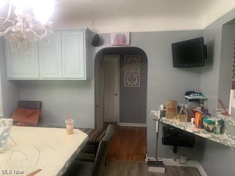 360 Tuxedo Ave, Brooklyn Heights, OH 44131 - dining area with wood finished floors and a chandelier