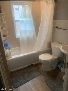 360 Tuxedo Ave, Brooklyn Heights, OH 44131 - full bath with shower / tub combo and wood finished floors