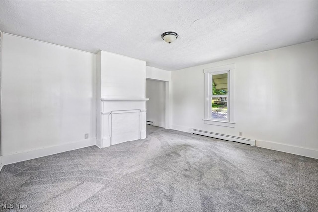 693 W Wilson St, Salem, OH 44460 - unfurnished room with a baseboard heating unit, a textured ceiling, and light carpet