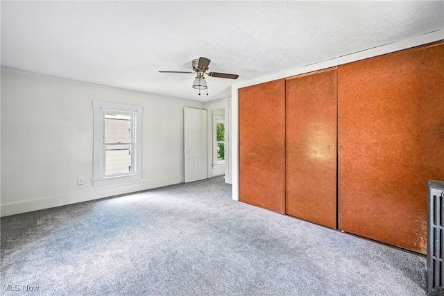 693 W Wilson St, Salem, OH 44460 - unfurnished bedroom featuring carpet floors, a closet, and a ceiling fan