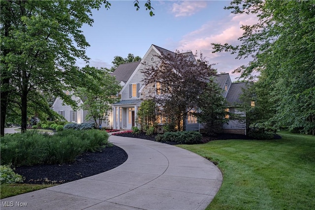 3925 Waterford Ct, Orange, OH 44122 - view of front facade featuring a yard, a standing seam roof, and a metal roof