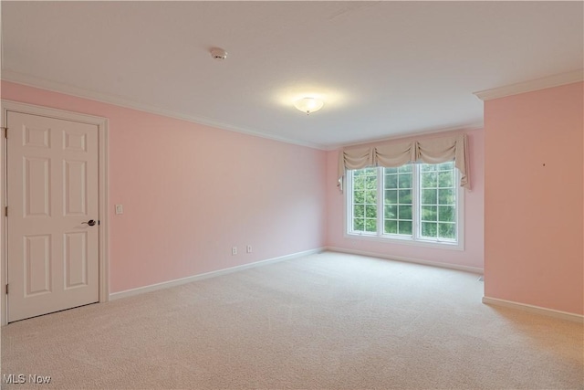 3925 Waterford Ct, Orange, OH 44122 - empty room with crown molding, a smoke detector, and carpet flooring